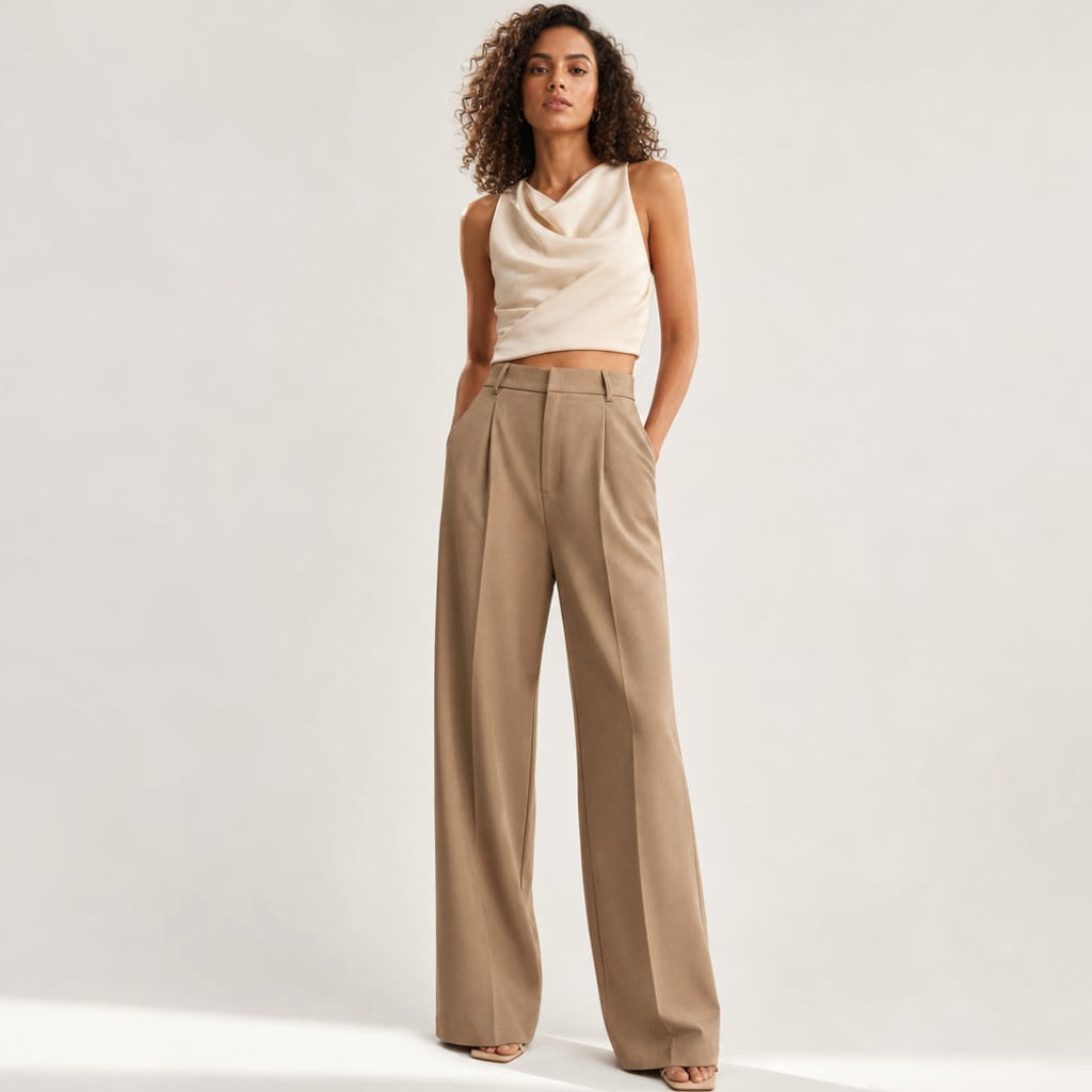 Pantalones anchos de tiro alto en color camel con corte sastre y pierna ancha vista de frente