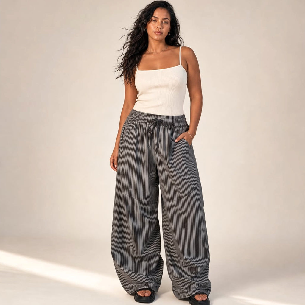 Pantalón barrel leg gris de tiro alto con cintura elástica, vista frontal completa